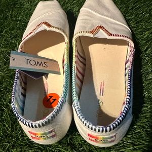 Tom’s pride slip ons brand new